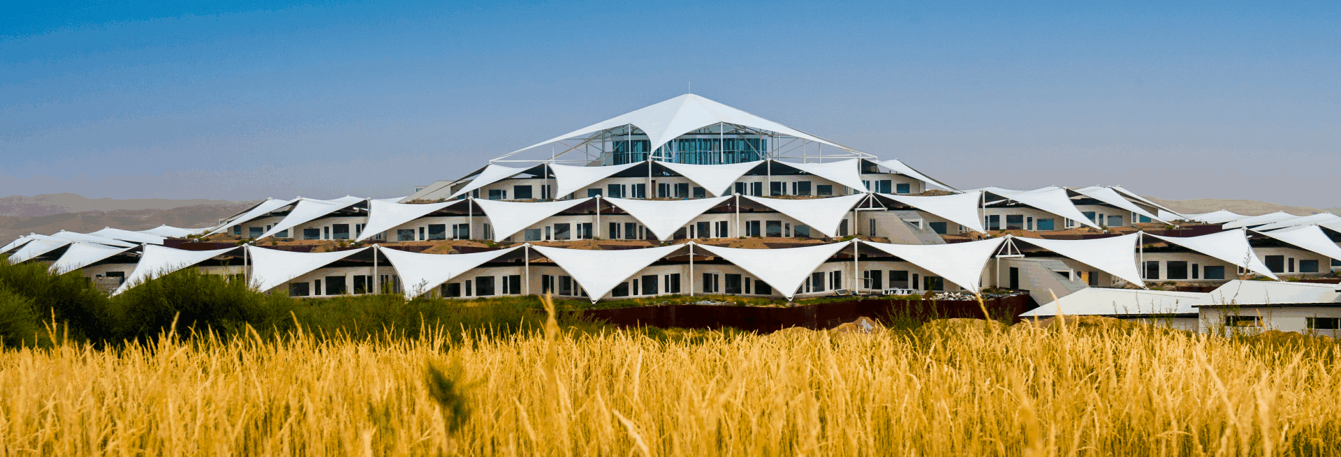膜结构车棚厂商：现代建筑美学与实用功能的完美结合   